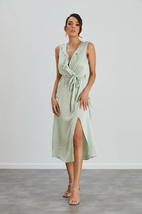 SLEEVELESS FRILL WRAP MIDI DRESS WITH LEG SLIT IN MINT GREEN